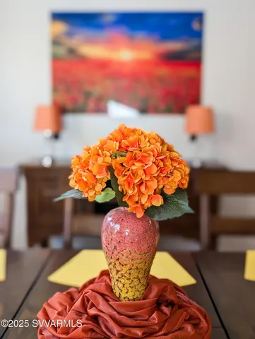 a bedroom with bed and window