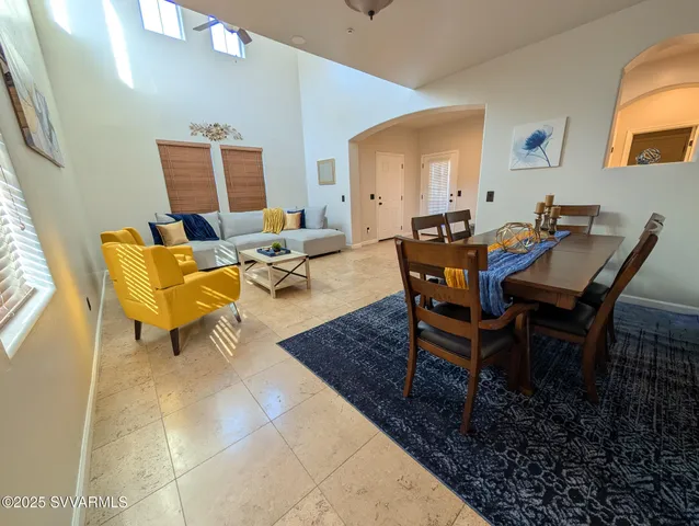 a bedroom with bed and window