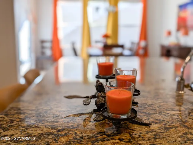 a kitchen with lots of counter space and appliances