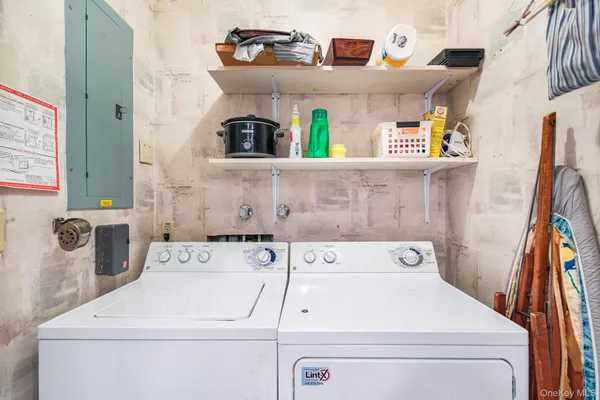 a utility room with dryer and washer