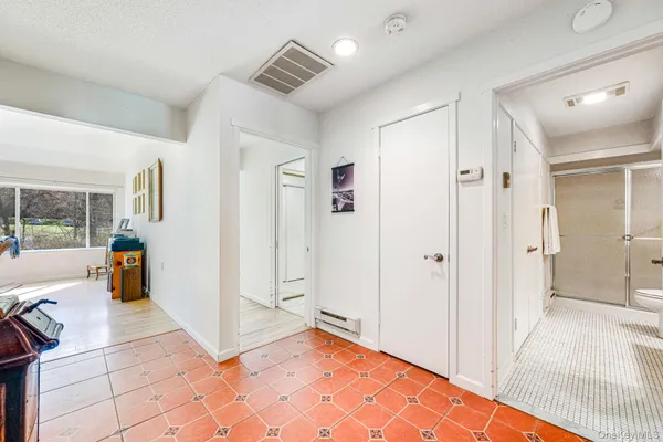 a kitchen with granite countertop cabinets a dining table and chairs
