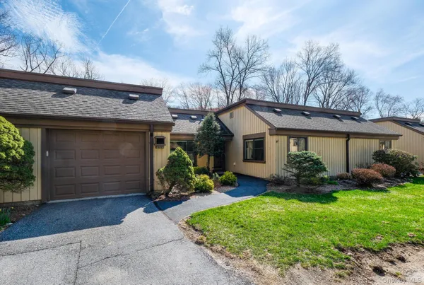 a picture of a bathroom with a shower