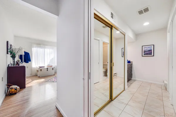 a view of a livingroom with furniture and wooden floor