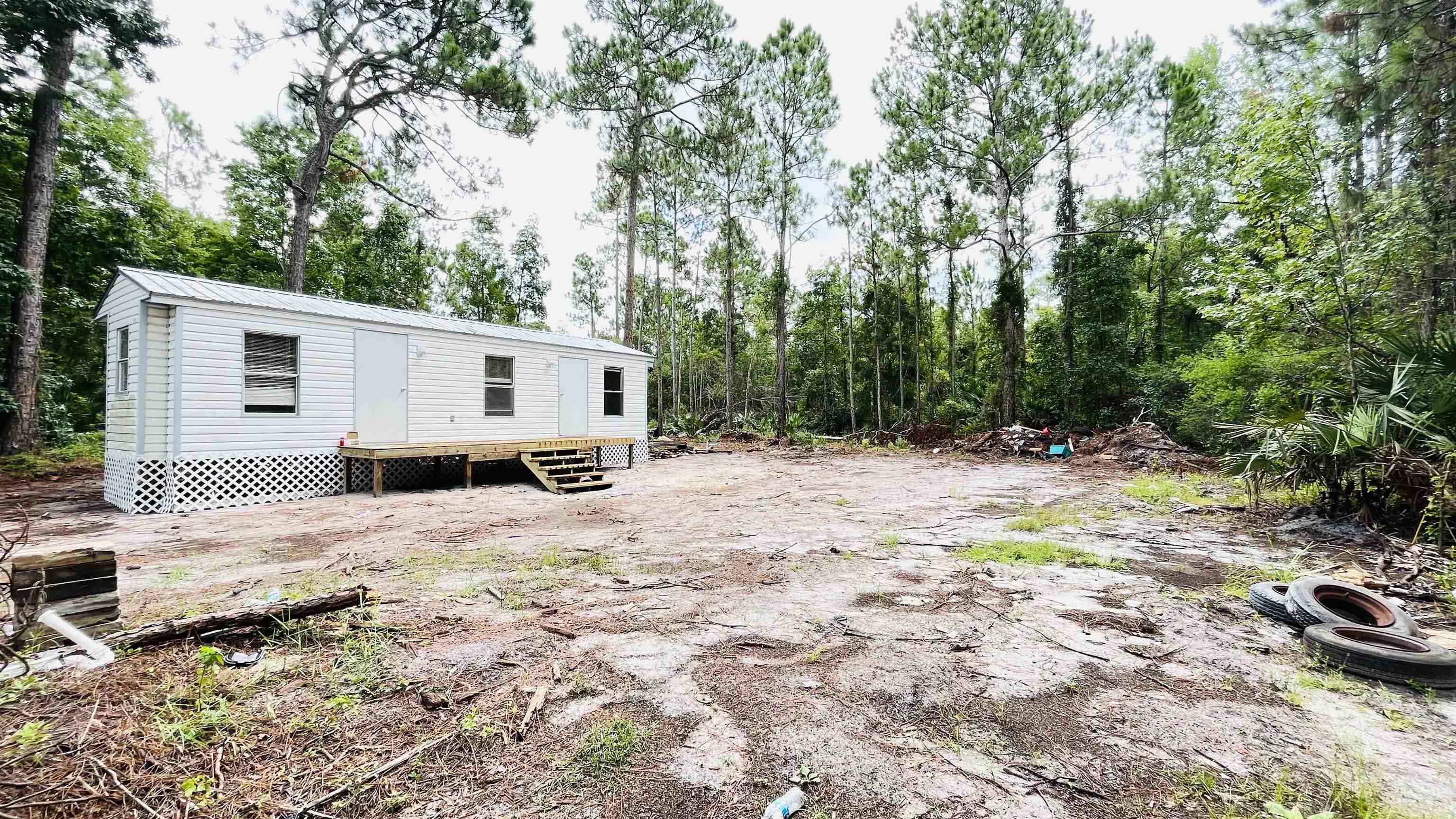 2100 Deer Run Road St. Augustine, FL 32084 - Photo 17 of 17 a view of a house with a yard covered in snow