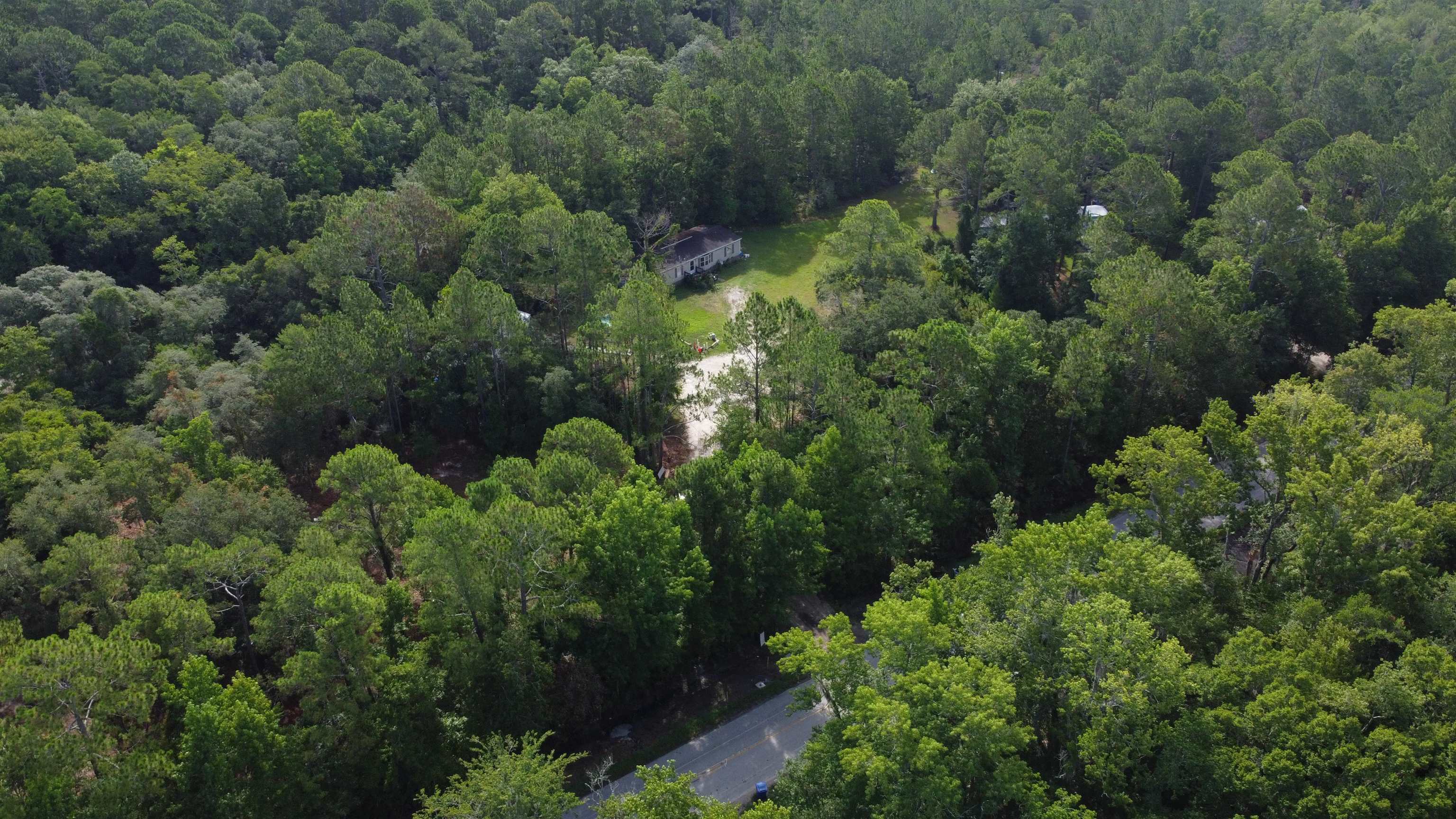 2100 Deer Run Road St. Augustine, FL 32084 - Photo 3 of 17 an aerial view of a house with a yard