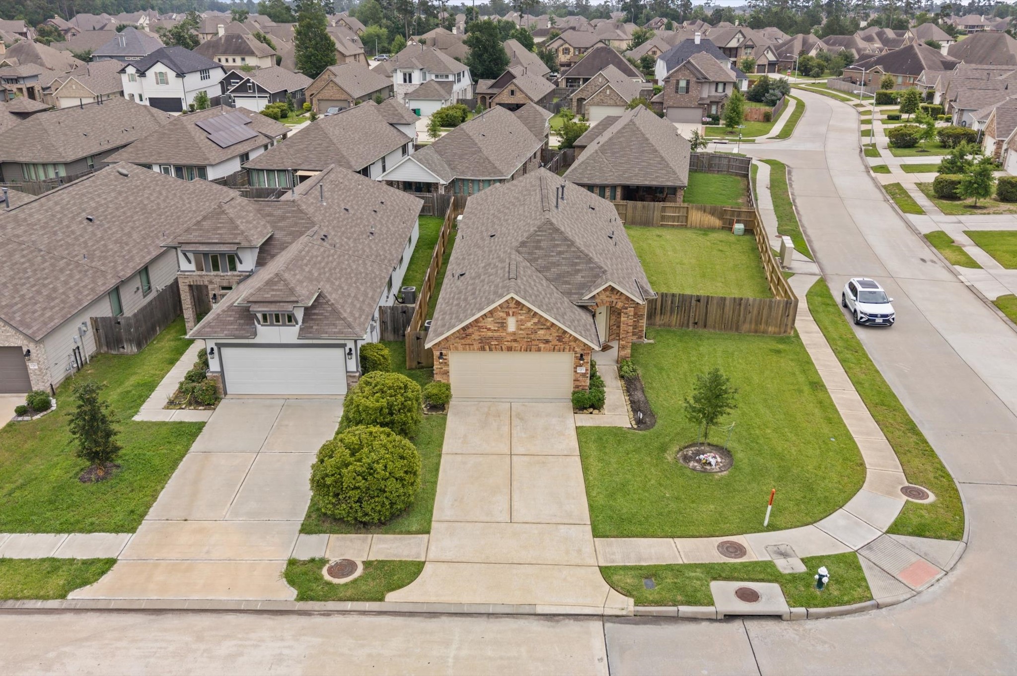 2702 Meadow View Lane Conroe, TX 77385 - Photo 22 of 26 an aerial view of a swimming pool