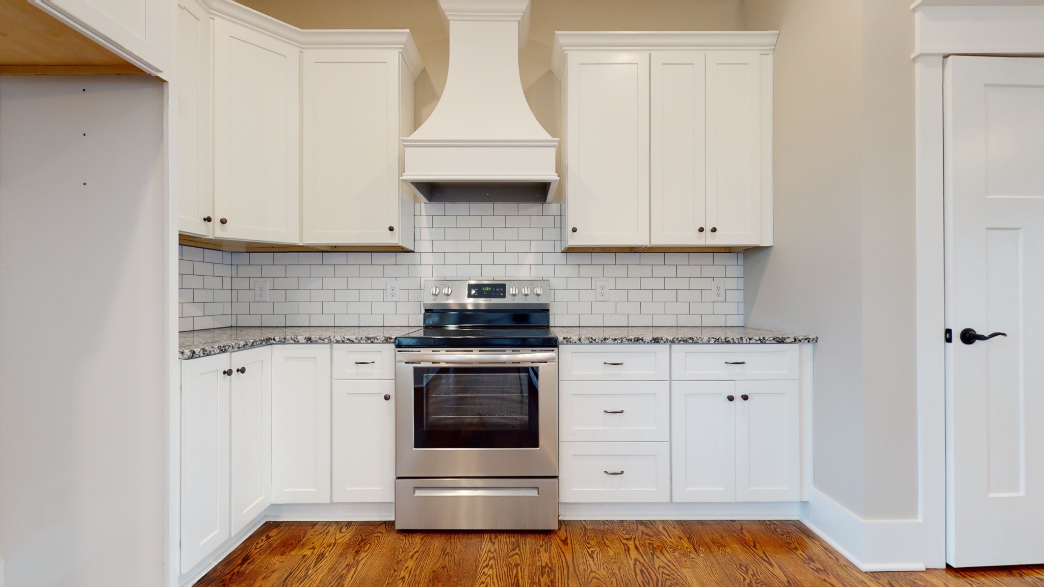 222 Red Hill Road Normandy, TN 37360 - Photo 18 of 51 a kitchen with white cabinets and white appliances