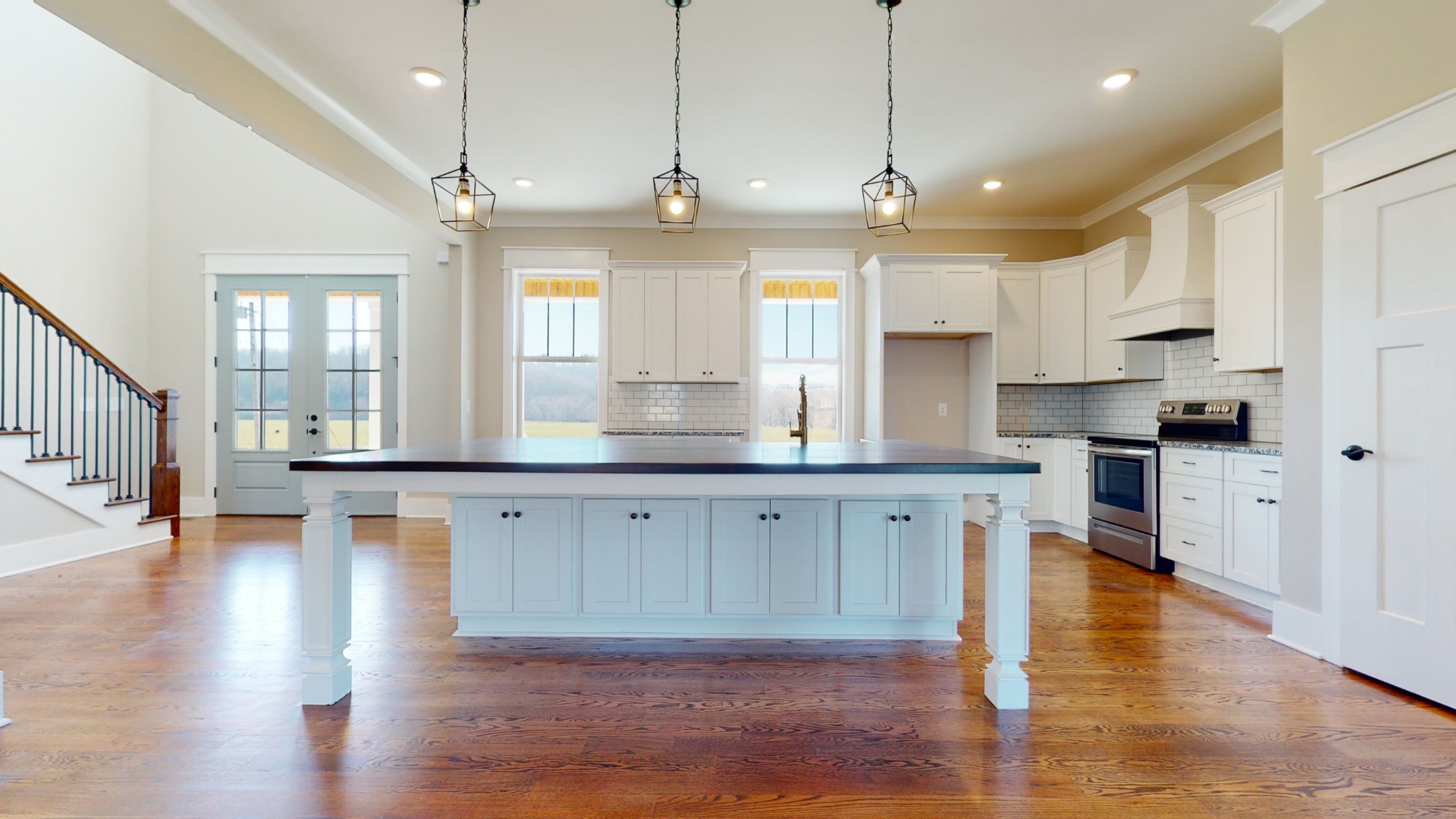222 Red Hill Road Normandy, TN 37360 - Photo 19 of 51 a large kitchen with granite countertop lots of counter space wooden floor and stainless steel appliances