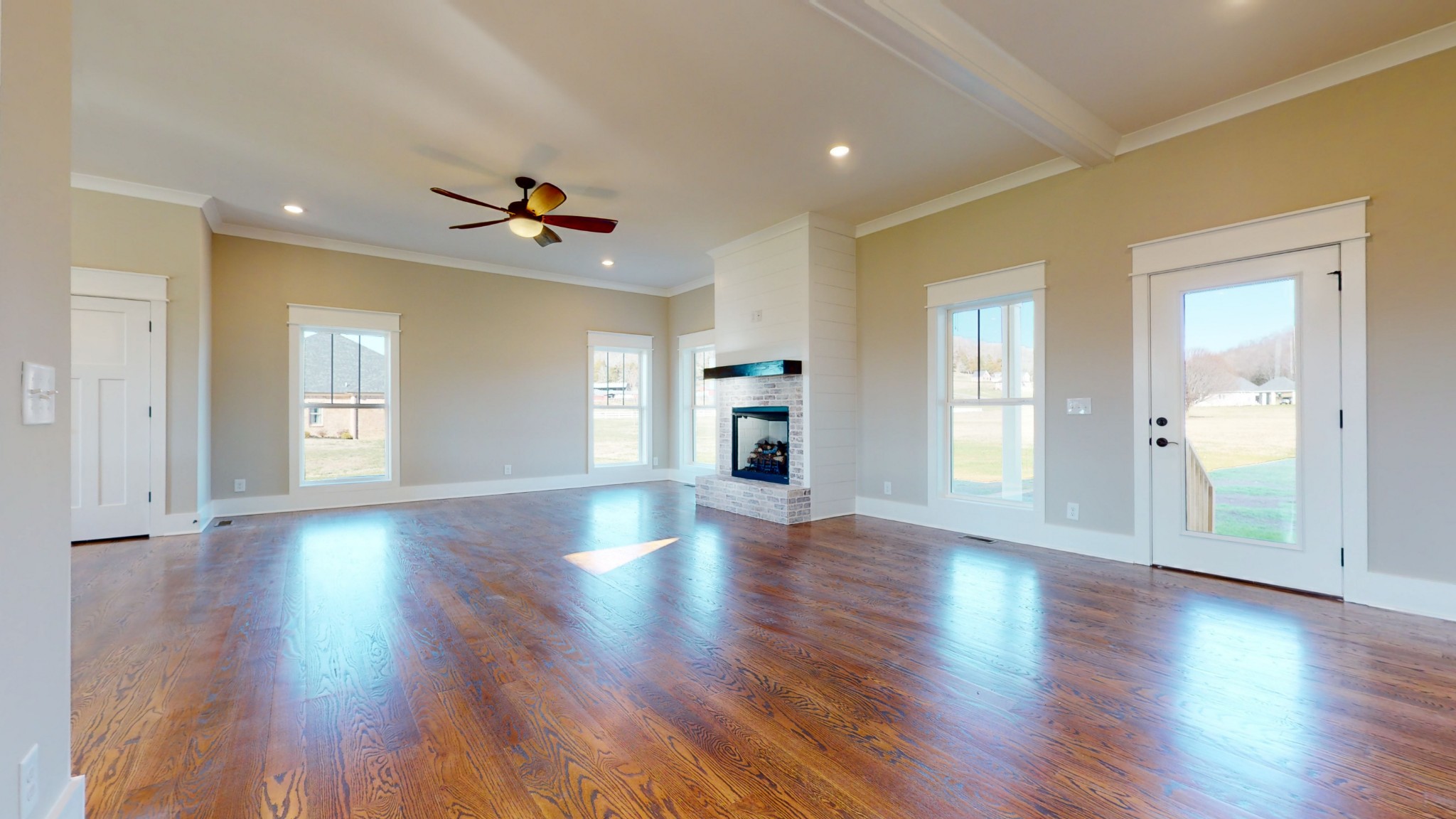 222 Red Hill Road Normandy, TN 37360 - Photo 23 of 51 a view of an empty room with wooden floor and a window