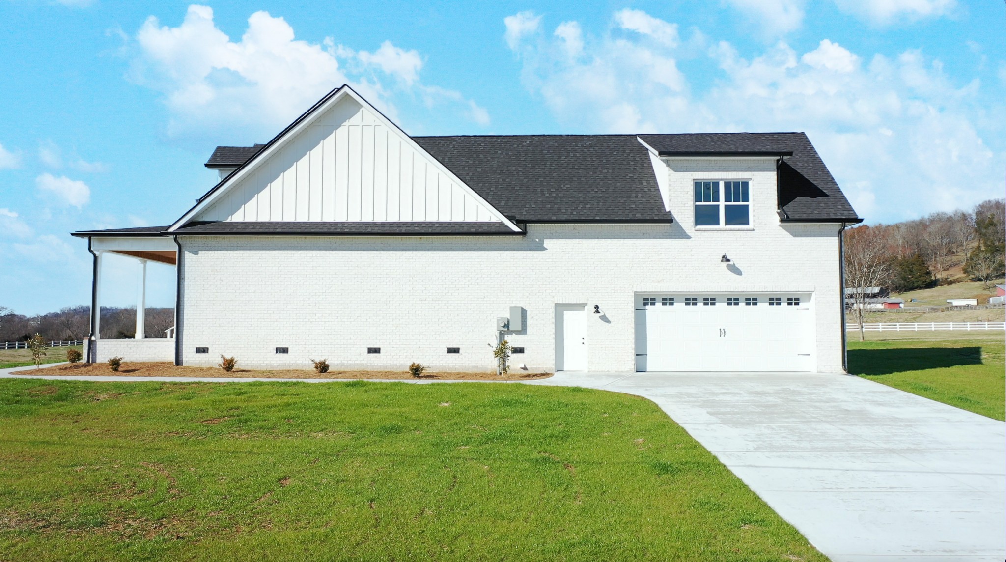 222 Red Hill Road Normandy, TN 37360 - Photo 4 of 51 a front view of a house with garden