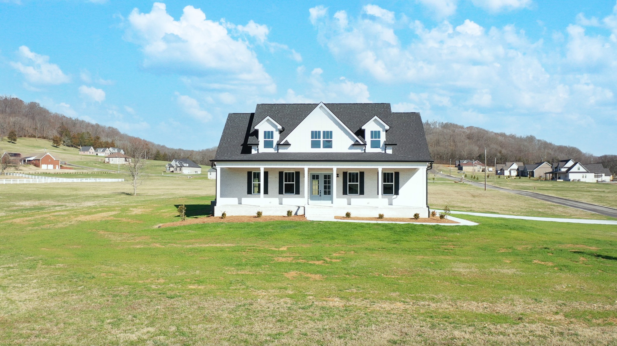222 Red Hill Road Normandy, TN 37360 - Photo 5 of 51 a front view of a house with a big yard