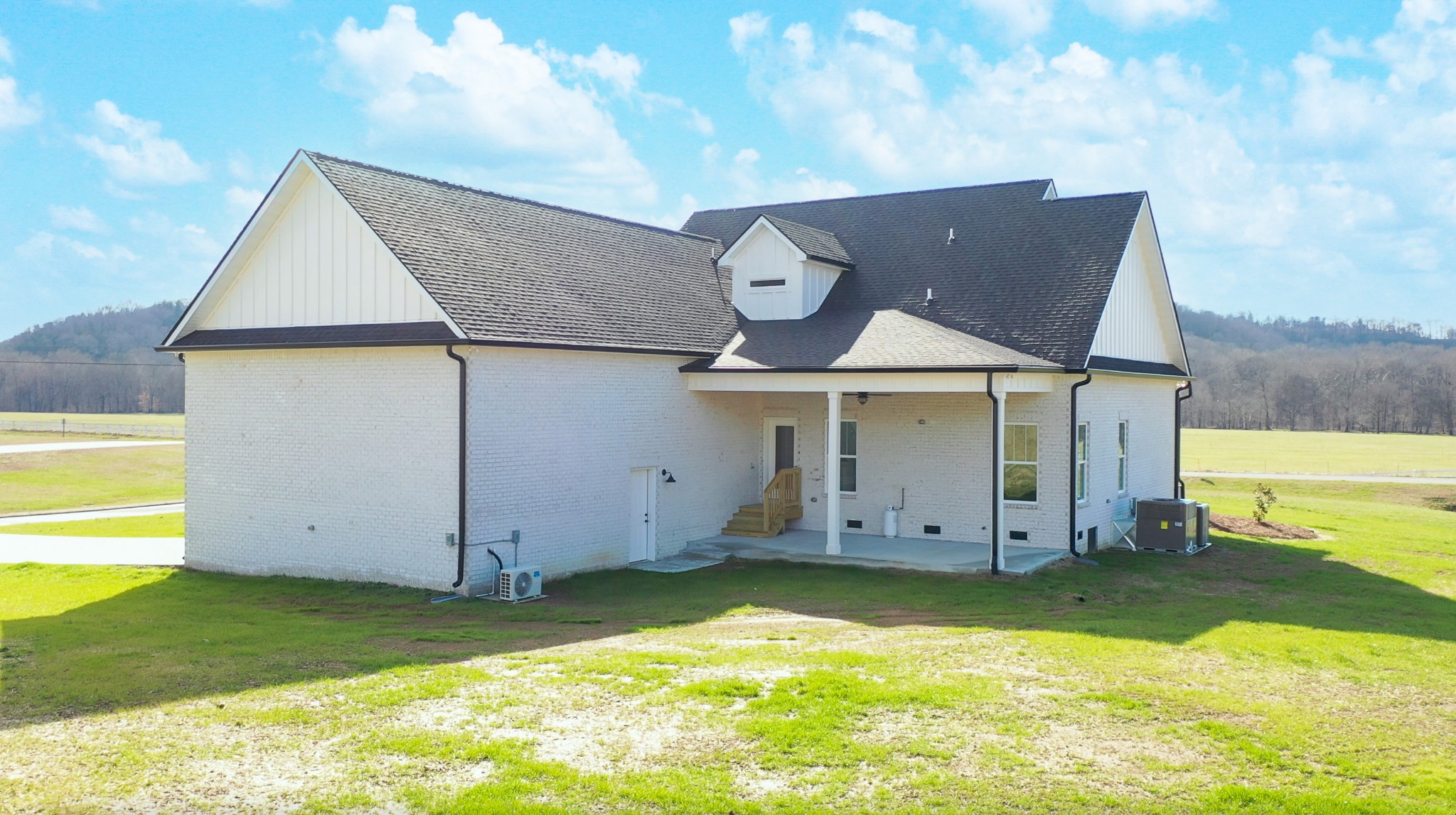 222 Red Hill Road Normandy, TN 37360 - Photo 10 of 51 a view of a house with a swimming pool
