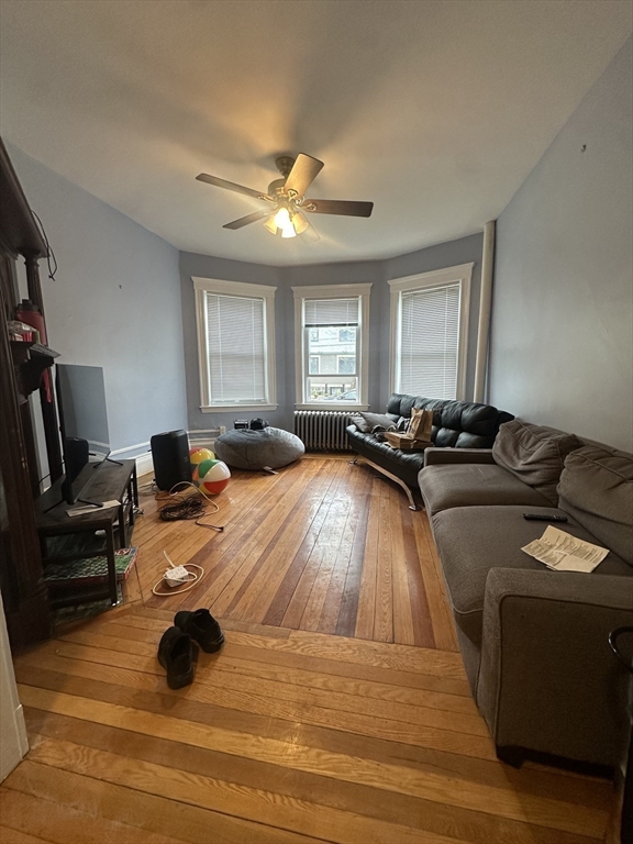 a bed room with a bed and a flat screen tv
