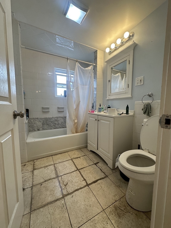 22 Winslow Road Brookline, MA 02446 - Photo 20 of 25 a bathroom with a sink toilet and shower