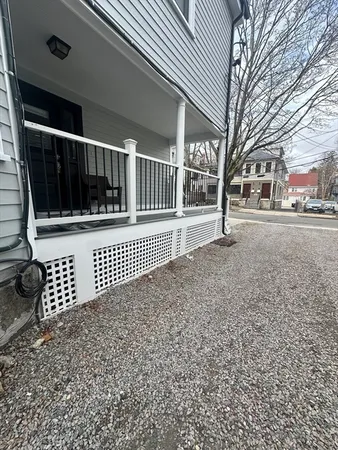 a view of a door with a bench