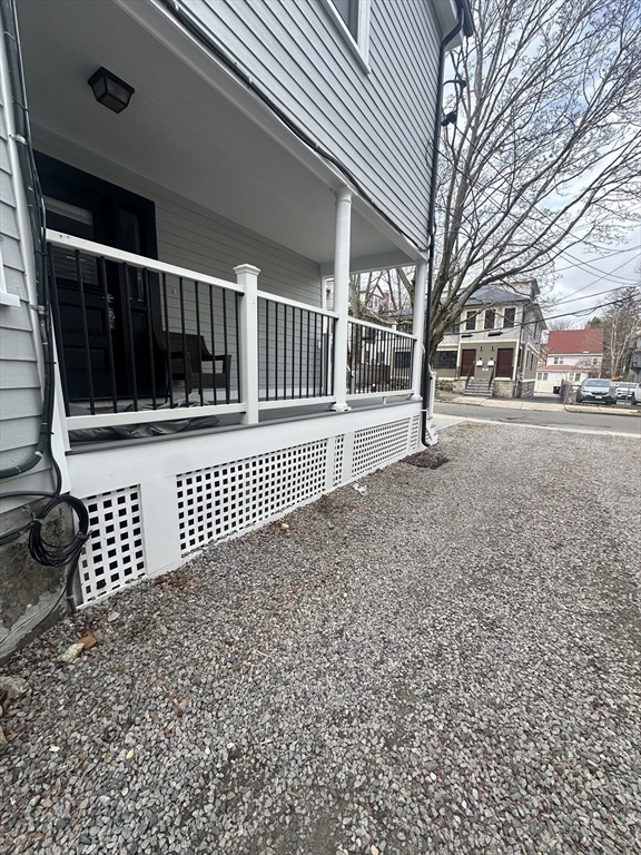 22 Winslow Road Brookline, MA 02446 - Photo 22 of 25 a view of a door with a bench