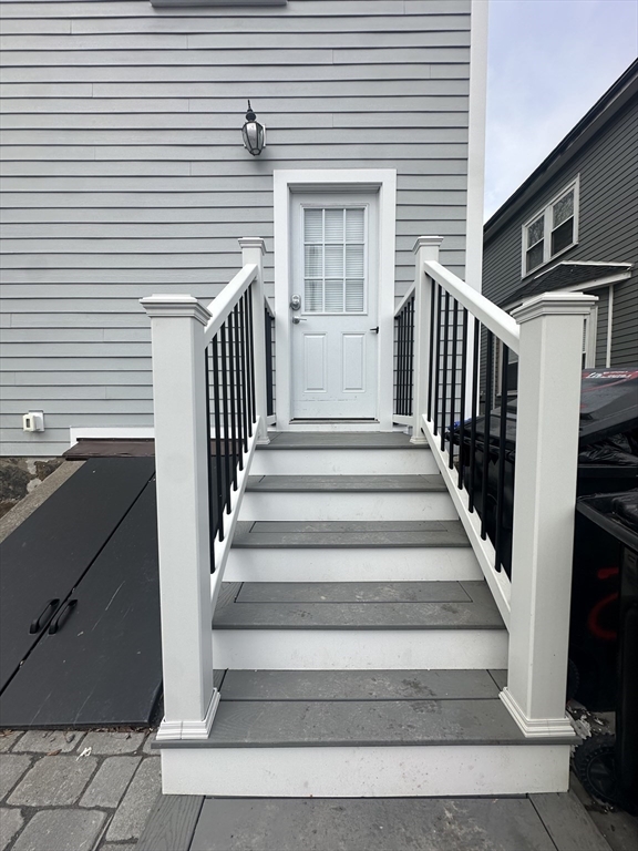 22 Winslow Road Brookline, MA 02446 - Photo 23 of 25 a view of entryway with a front door