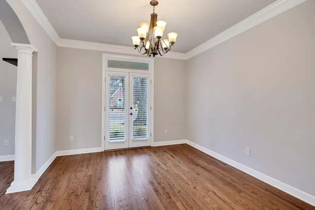 a view of a livingroom with wooden floor