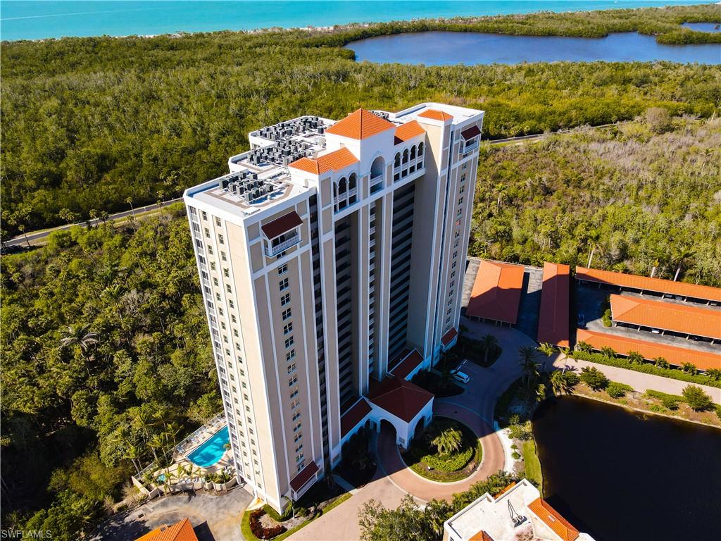 6573 Marissa Loop, Unit 903 Naples, FL 34108 - Photo 20 of 25 a view of a chairs and table in the terrace