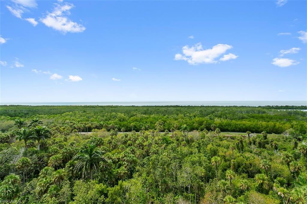 6573 Marissa Loop, Unit 903 Naples, FL 34108 - Photo 25 of 25 a view of a green field