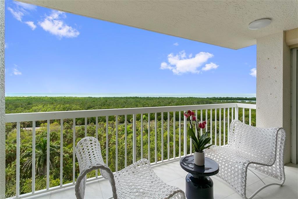 6573 Marissa Loop, Unit 903 Naples, FL 34108 - Photo 8 of 25 a view of a balcony with chair
