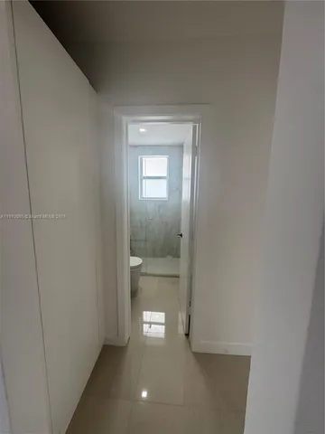 a bathroom with a toilet