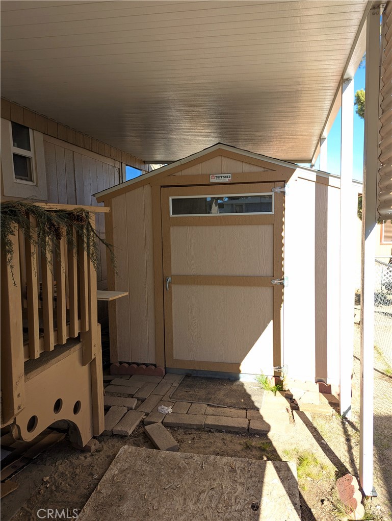 10200 Johnson Road, Unit 36 Phelan, CA 92371 - Photo 21 of 22 a view of storage and utility room