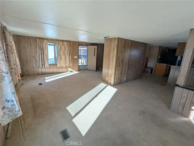 a view of a livingroom with a staircase