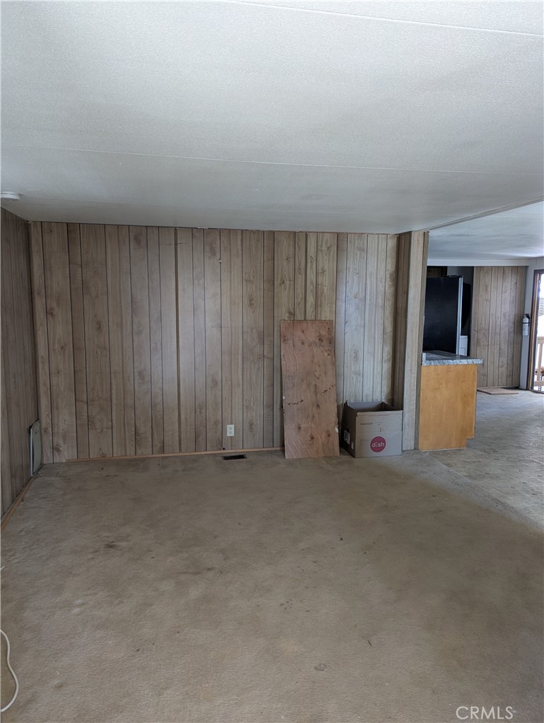10200 Johnson Road, Unit 36 Phelan, CA 92371 - Photo 4 of 22 a view of a livingroom with a staircase