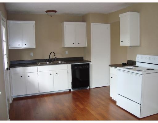 3023 Pimlico Lane Corpus Christi, TX 78418 - Photo 2 of 4 a kitchen with cabinets appliances and a sink