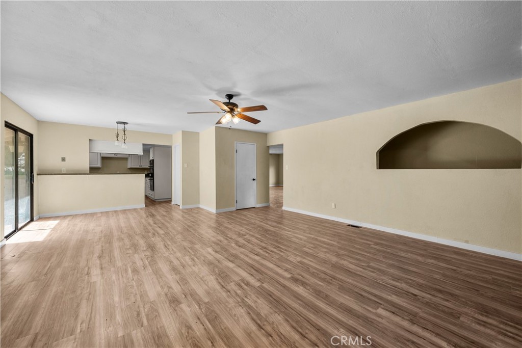 29570 Butterfield Way Tehachapi, CA 93561 - Photo 23 of 50 a view of a kitchen with a sink and a stove top oven