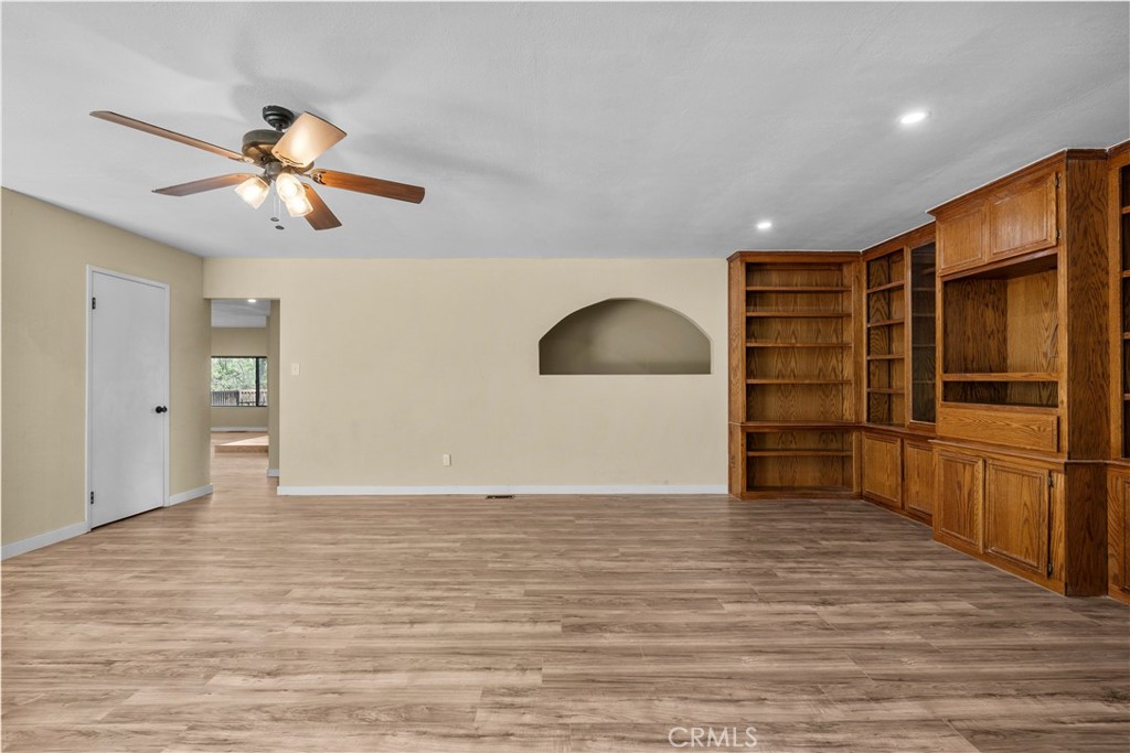 29570 Butterfield Way Tehachapi, CA 93561 - Photo 24 of 50 wooden floor in an empty room with a window