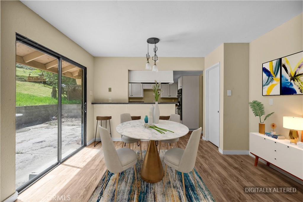 29570 Butterfield Way Tehachapi, CA 93561 - Photo 25 of 50 a view of a dining room with furniture window and outside view