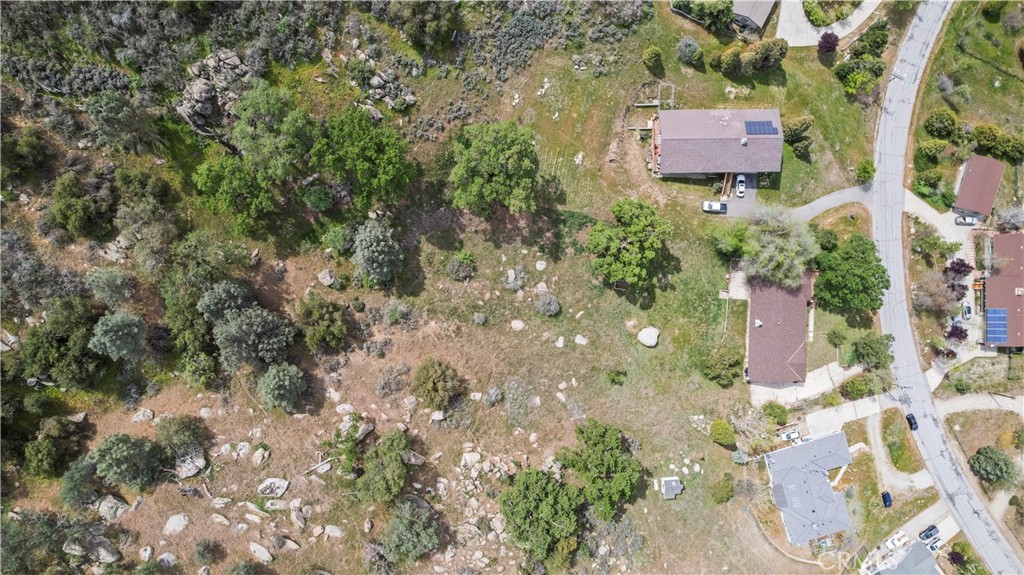 29570 Butterfield Way Tehachapi, CA 93561 - Photo 3 of 50 a aerial view of a house with a yard and sitting area