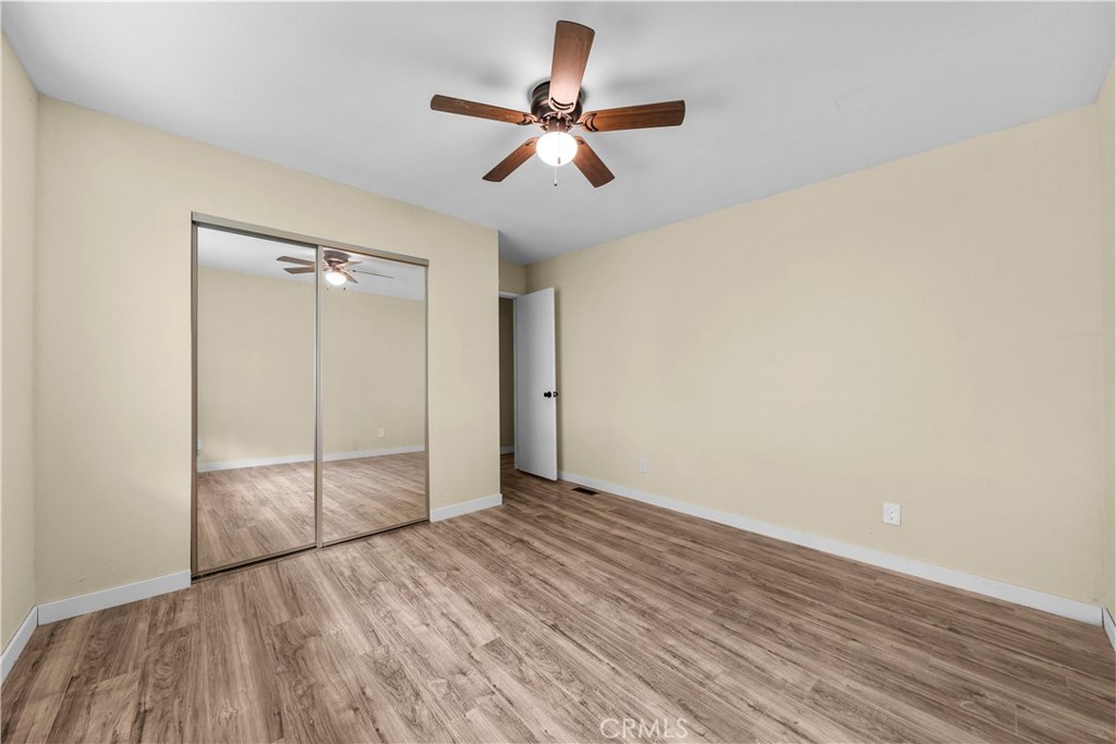 29570 Butterfield Way Tehachapi, CA 93561 - Photo 34 of 50 wooden floor in an empty room