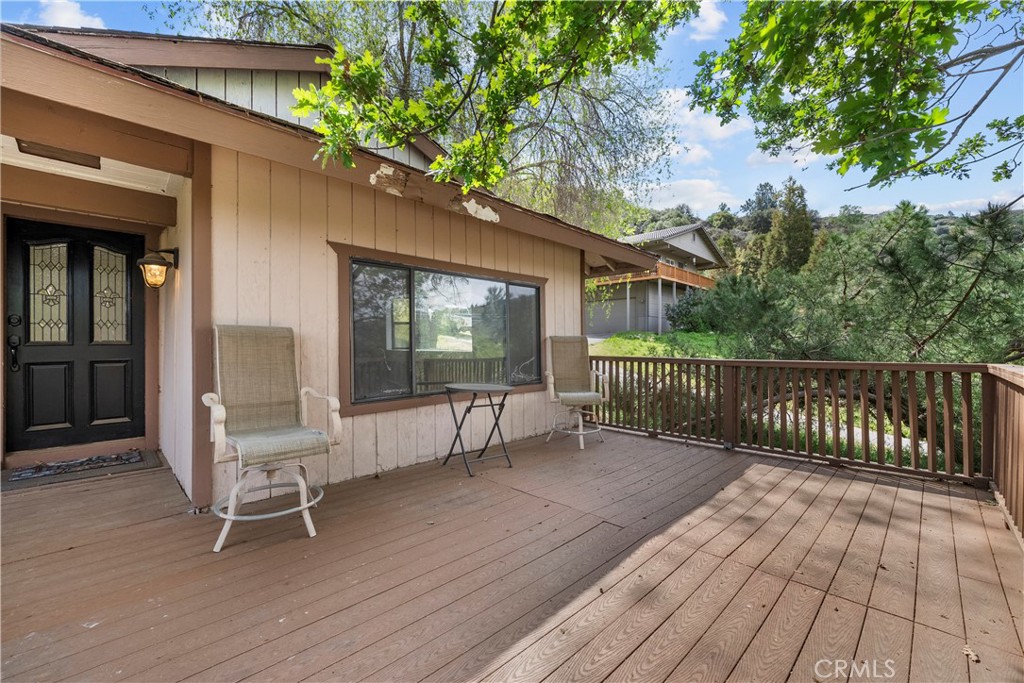29570 Butterfield Way Tehachapi, CA 93561 - Photo 48 of 50 a view of a chair and tables in the balcony