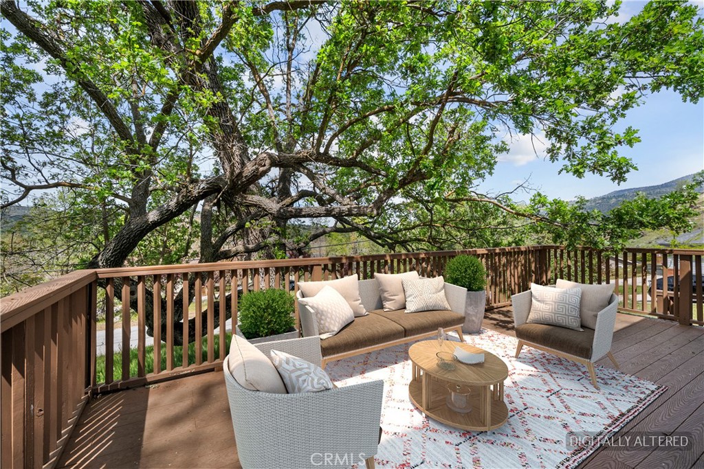 29570 Butterfield Way Tehachapi, CA 93561 - Photo 49 of 50 a view of balcony with couches and wooden fence