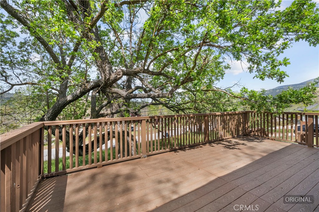 29570 Butterfield Way Tehachapi, CA 93561 - Photo 50 of 50 a balcony with wooden floor and fence