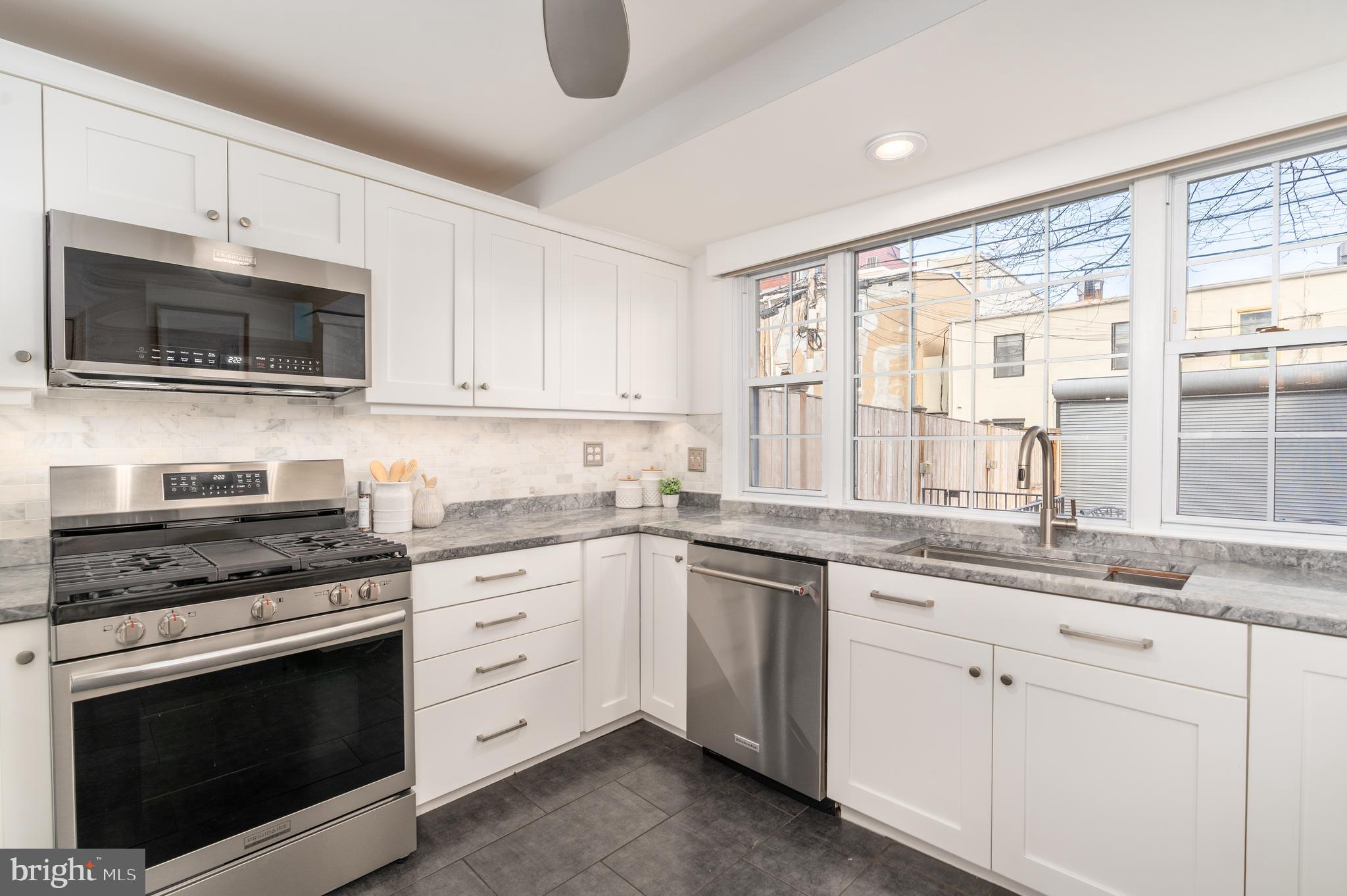 744 7th Street Southeast Washington, DC 20003 - Photo 16 of 37 Kitchen with wall of windows to rear patio