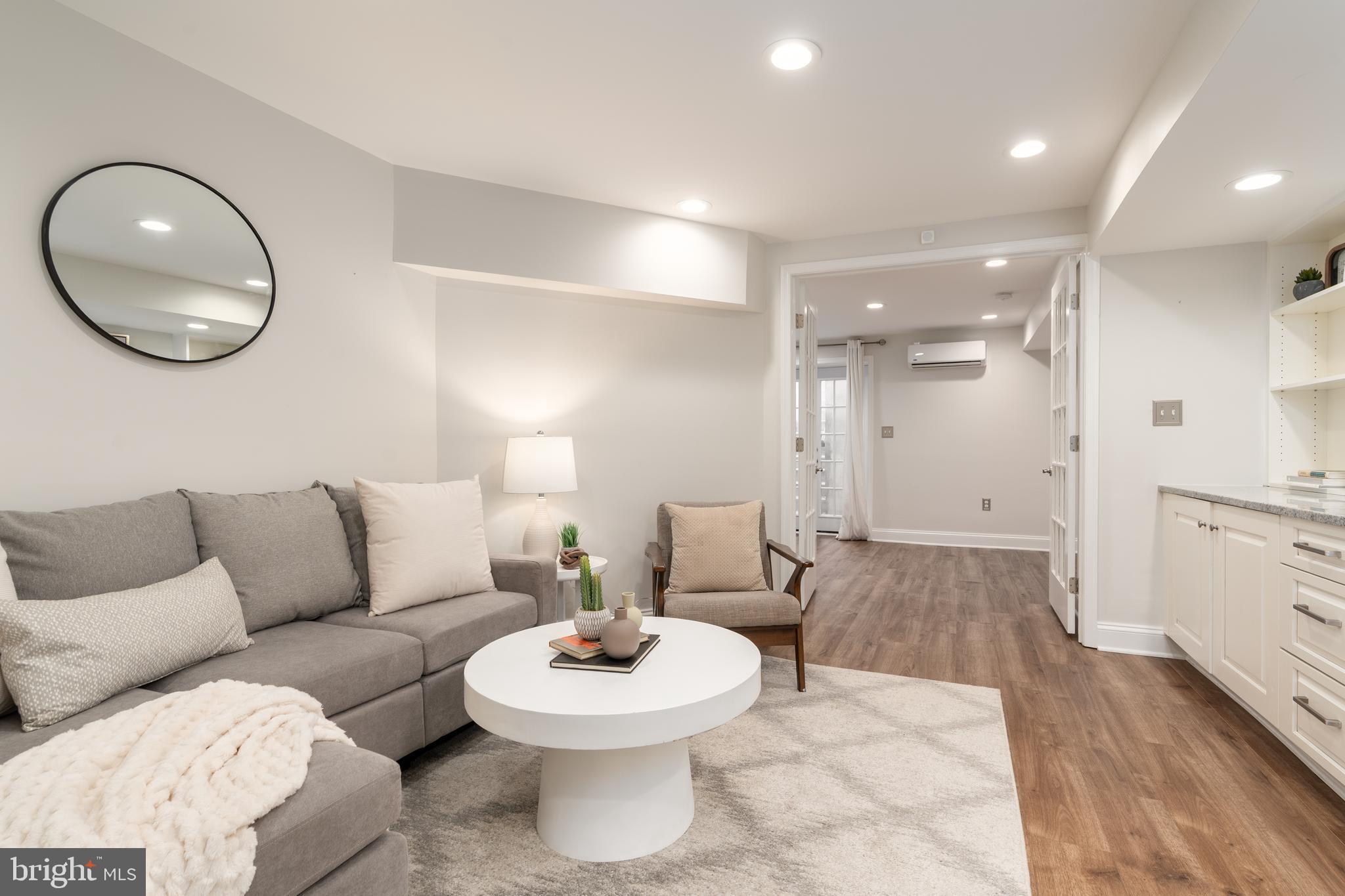 744 7th Street Southeast Washington, DC 20003 - Photo 26 of 37 Lower level sitting area and bedroom suite