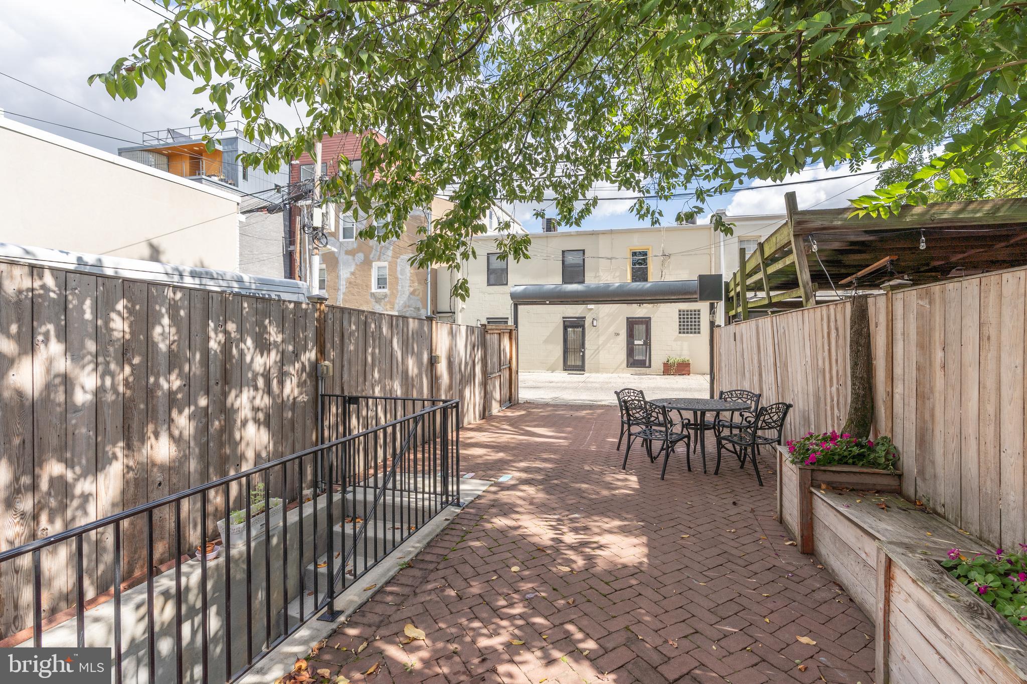 744 7th Street Southeast Washington, DC 20003 - Photo 33 of 37 Rear exterior patio and parking