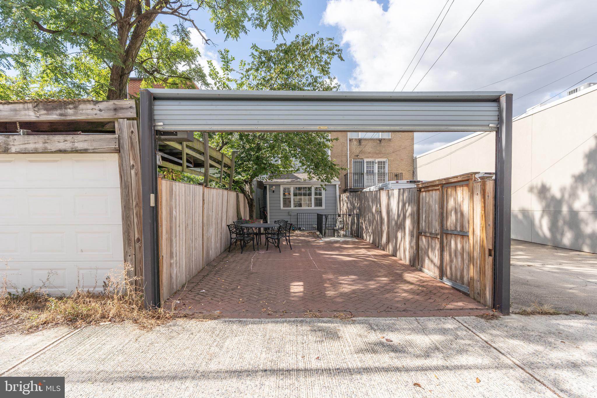 744 7th Street Southeast Washington, DC 20003 - Photo 34 of 37 Private parking with roll down metal gate