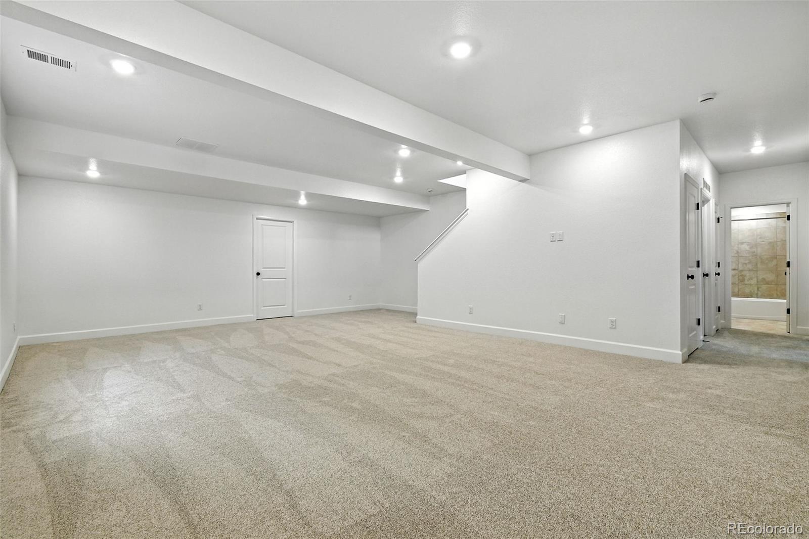 17075 West 92nd Loop Arvada, CO 80007 - Photo 25 of 33 an empty room with an entryway