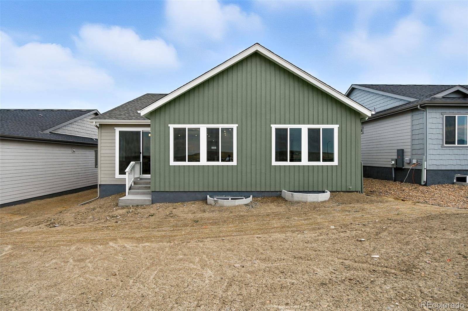 17075 West 92nd Loop Arvada, CO 80007 - Photo 28 of 33 a view of a house with wooden fence