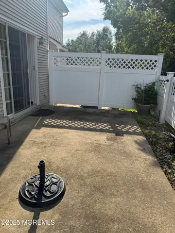 a view of a fountain in the backyard of the house