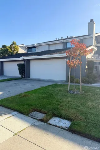 a view of a backyard with plants