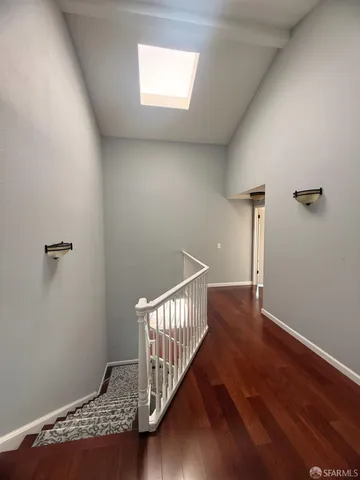 a bathroom with a sink mirror and vanity