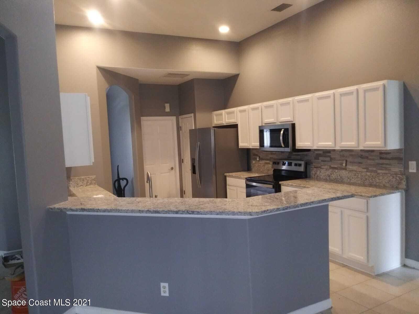 441 Crystal Mist Road Northwest Palm Bay, FL 32907 - Photo 2 of 6 IMG-20210616-WA0018