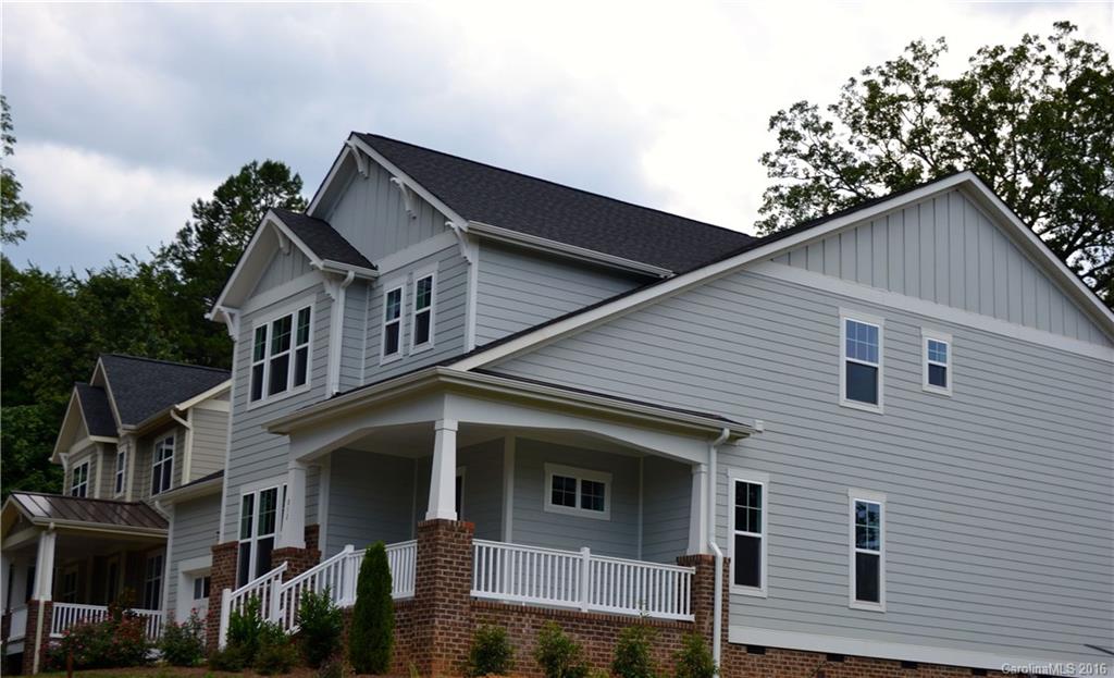 7119 Ramsgate Road, Unit 2C Charlotte, NC 28270 - Photo 3 of 3 a front view of a house with a tree