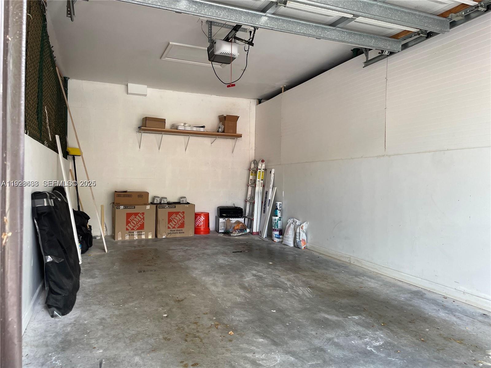 2031 Renaissance Boulevard, Unit 101 Miramar, FL 33025 - Photo 22 of 23 a view of a room with gym equipment